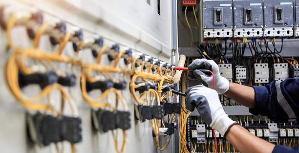 Professional Electrician technician working in Brookside Village, TX